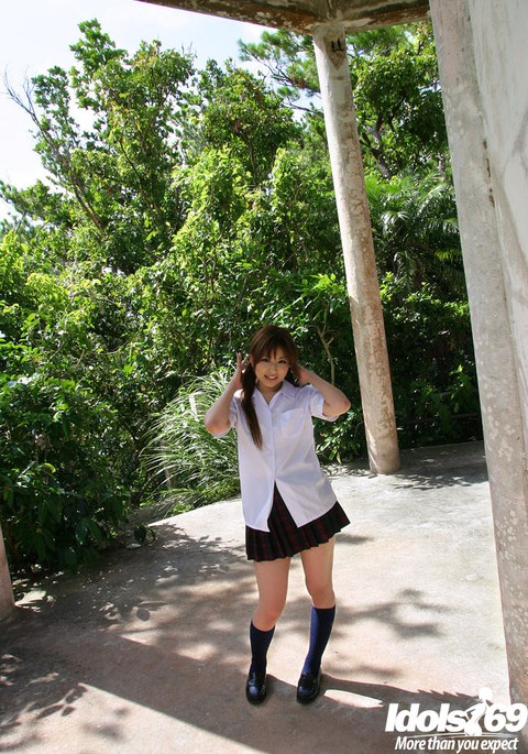 Lovely asian babe Miyu Sugiura taking off her school uniform outdoor | Фото 1