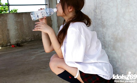 Lovely asian babe Miyu Sugiura taking off her school uniform outdoor | Фото 11