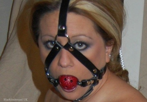 Chubby blonde sports a ball gag while topless & restrained in purple pantyhose | Фото 9