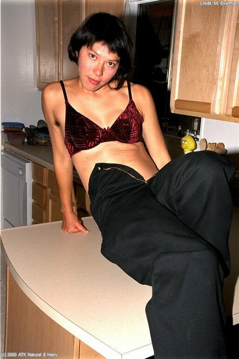 Amateur Asian woman Amanda takes her black panties off and reveals big bush | Фото 2