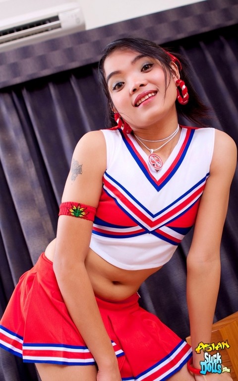 Tiny Asian cheerleader Mini licks a penis with a pierced tongue in cute undies | Фото 9