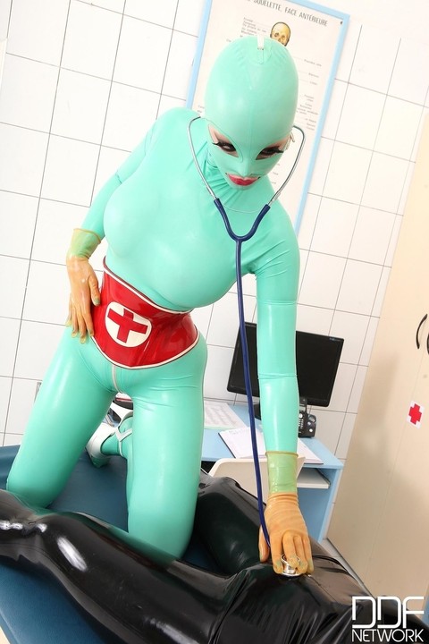 Babe in an aqua-blue latex suit Latex Lucy gets rammed by a masked man | Фото 4