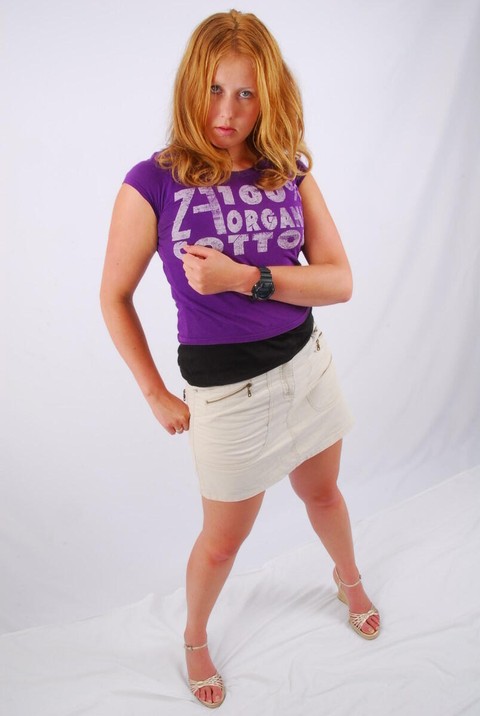 Natural redhead Judy models a black G-Shock watch while fully clothed | Фото 15