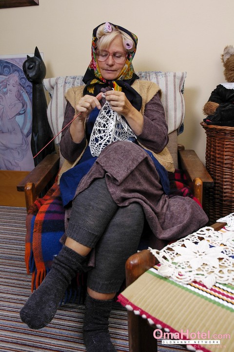 Granny with eyeglasses Christina toying her mature vagina on the carpet