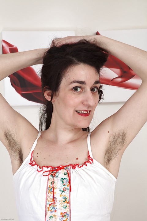 Ugly mature woman with hairy armpits and pussy strips on camera. | Фото 2