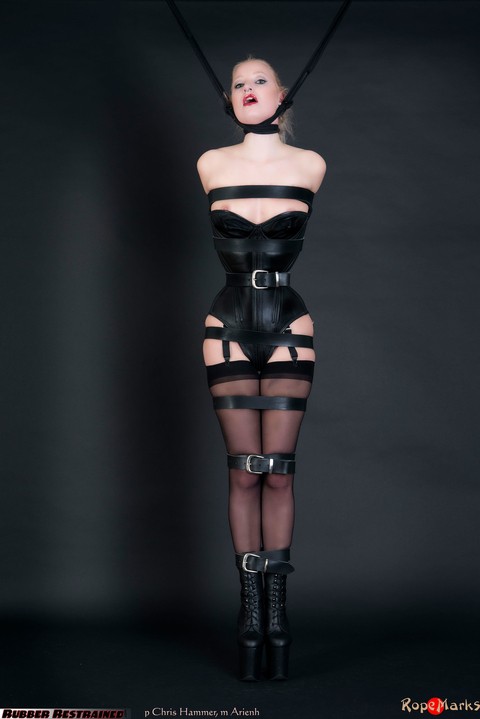 Fair skinned blonde Arienh Autumn is tied up with rope in a vintage corset | Фото 12