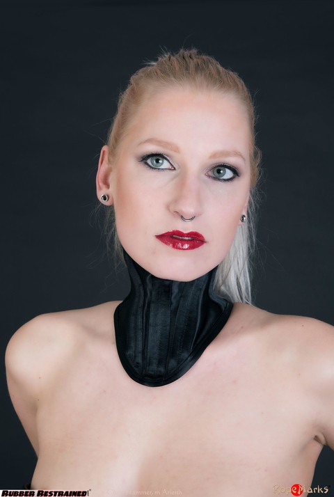 Fair skinned blonde Arienh Autumn is tied up with rope in a vintage corset | Фото 4