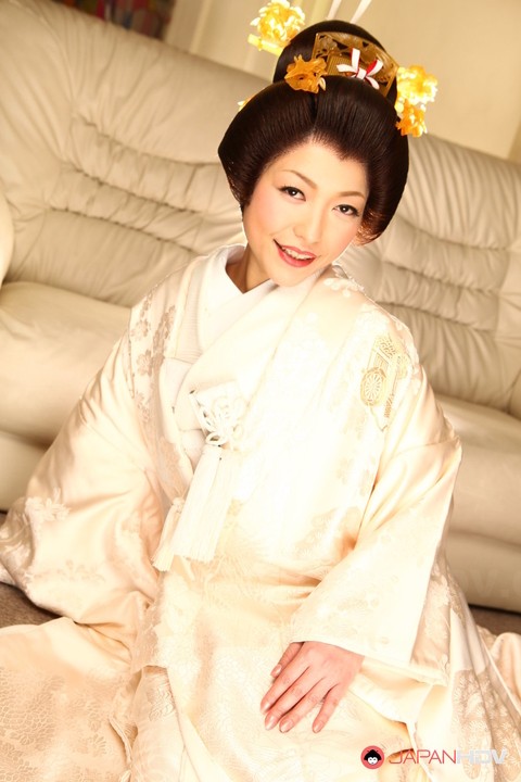 Japanese woman Yui Ayana has her breasts fondled under traditional clothing