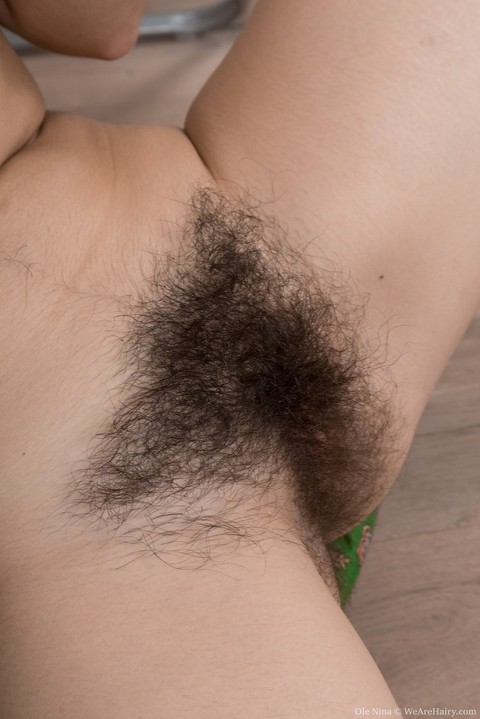 Dark haired Ole Nina removes her white pantyhose to reveal her very hairy muff | Фото 14