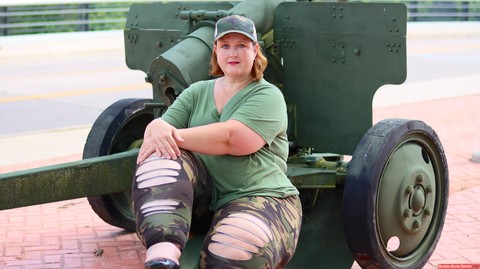 Obese amateur Goddess Pear models for a SFW shoot on an artillery gun in camo | Фото 12