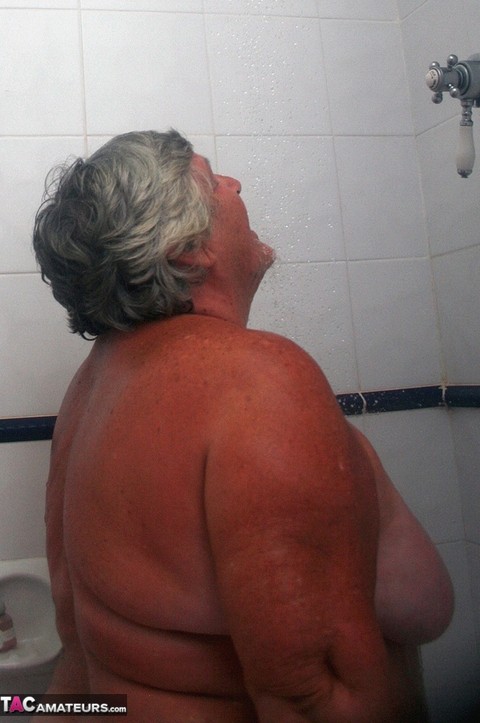 Obese old woman Grandma Libby gets completely naked while having a bath