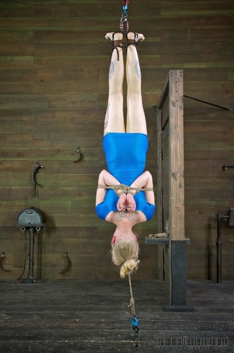 Blonde chick Sarah Jane Ceylon has her ass caned while suspended upside down | Фото 9