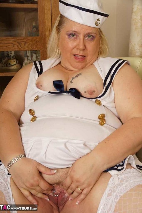 Blonde BBW Lexie Cummings plays with her pierced pussy in a sailor uniform | Фото 12