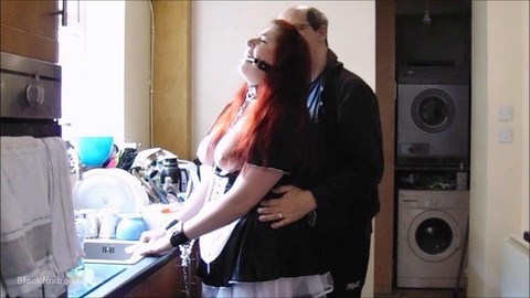 Obese redheaded maid Mada Rose does the dishes while gagged and cuffed | Фото 3