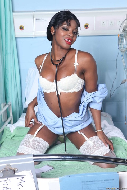 Hot ebony nurse Jasmine Webb in white stockings fingers herself passionately | Фото 5