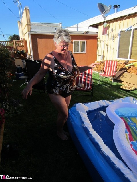 Fatty mature granny Girdle Goddess peels to enjoy wading pool skinny dip | Фото 9