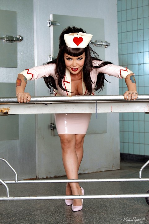 Naughty nurse Masuimi Max strips to show big tits & her hot body in a morgue | Фото 6