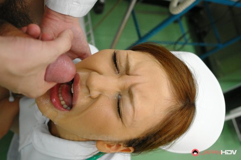 Lusty Japanese nurse Mio Kuraki deepthroats a doctor's dick and swallows cum | Фото 18