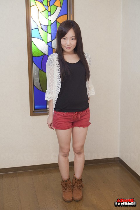 Innocent Japanese babe poses in her cute red short at the casting | Фото 7