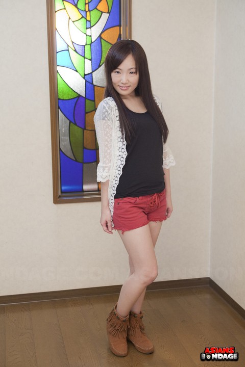 Innocent Japanese babe poses in her cute red short at the casting | Фото 8