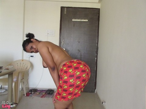 Topless Indian woman begins to pull down her shorts and underwear | Фото 7