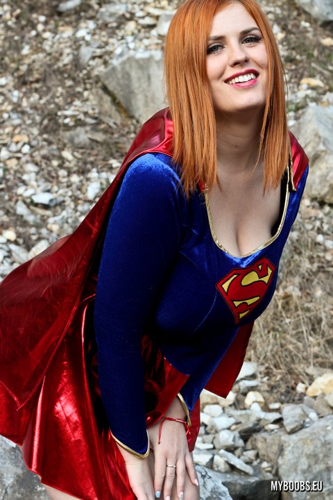 Thick redhead Alexsis Faye releases her giant tits from Superman osutfit | Фото 1