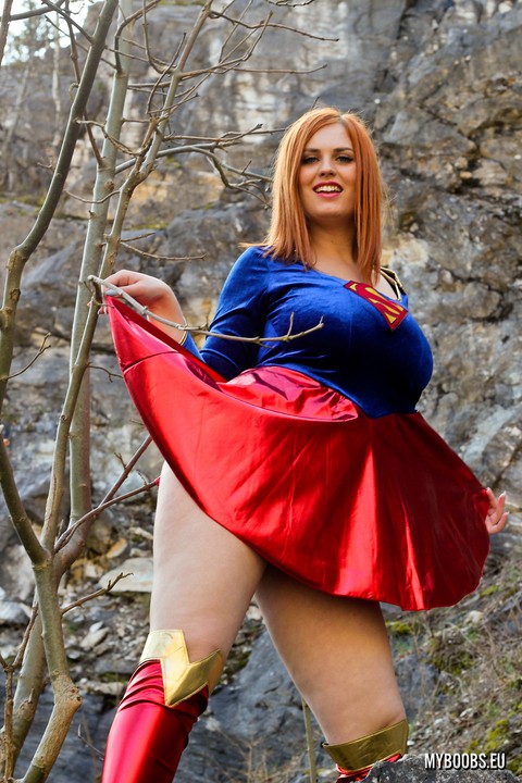 Thick redhead Alexsis Faye releases her giant tits from Superman osutfit | Фото 5