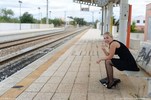 Kinky MILF Aston inserts glasses in her cunt while waiting for a train to come | Фото 19