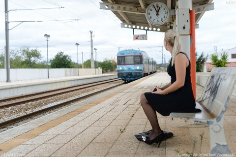 Kinky MILF Aston inserts glasses in her cunt while waiting for a train to come | Фото 20