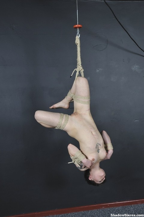 Tattooed female is bound with roped and suspended from the ceiling | Фото 10