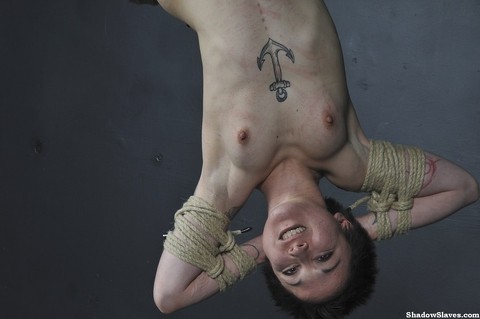 Tattooed female is bound with roped and suspended from the ceiling | Фото 15