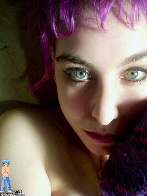 Solo girl Babybird takes self shots while sporting striking eyes and dyed hair