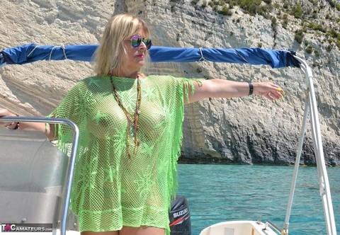 Beefy big Nude Chrissy pilots her boat naked to sun her round plump tits | Фото 12