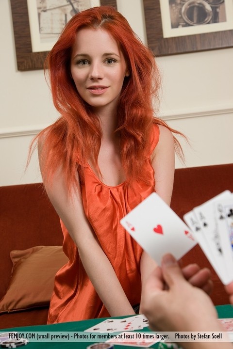 Hot redhead Ariel removes clothes after losing at poker & rolls in the chips | Фото 1