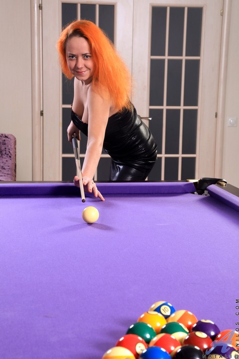 Redhead amateur Natali shows her bush on a pool table after getting naked | Фото 3