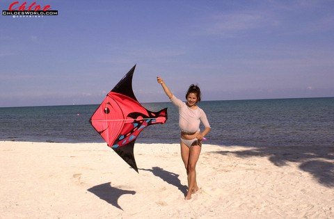 Super busty Chloe Vevrier letting her massive big tits hang loose at the beach | Фото 2