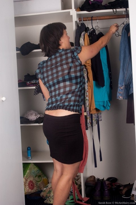 Busty German wife Sarah Rose spreads her hairy cunt while posing in the closet | Фото 3