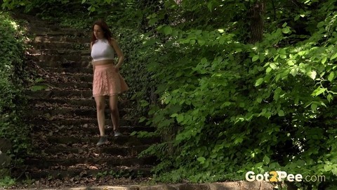 Naughty Euro girl Antonia hiking skirt to take a pee in the forest | Фото 1