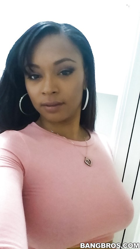 Curvy black chick Porsha Carrera taking selfies of her big black tits