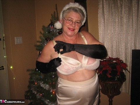 Old woman Girdle Goddess sticks a wine bottle in her pussy at Christmas | Фото 10