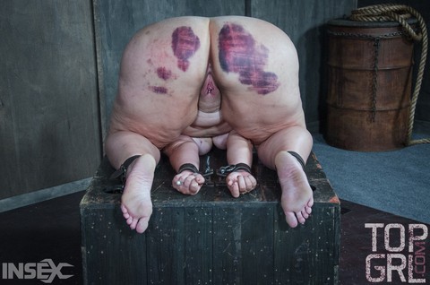 Fat chick undergoes extreme torture session and bruising in a dungeon | Фото 11