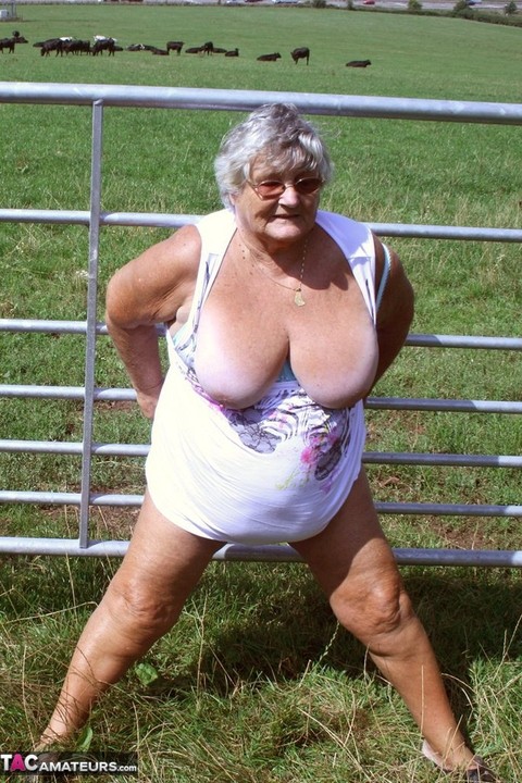 Old British woman Grandma Libby exposes herself next to a field of cattle | Фото 13