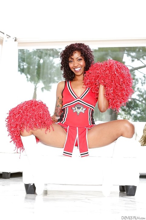 Ebony cheerleader Devils Film is showing all of her tattoos