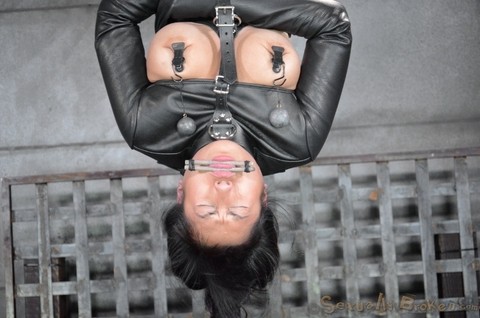 Asian chick Mia Li is suspended upside down while being made to suck cock | Фото 10