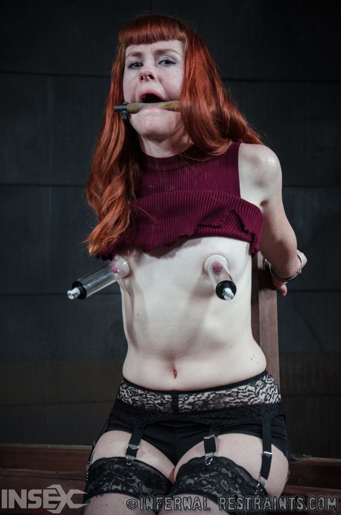 Natural redhead Barbary Rose is subjected to humiliating abuse in a dungeon | Фото 6