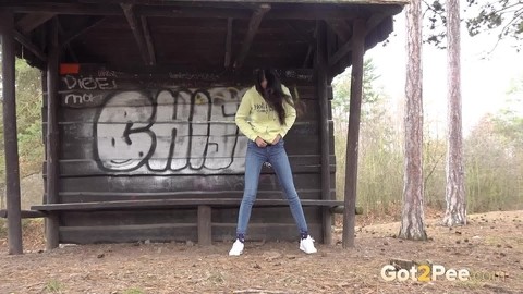 Tiny brunette Mistika squats for a piss next to a warming station in the woods | Фото 14