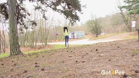 Tiny brunette Mistika squats for a piss next to a warming station in the woods | Фото 15