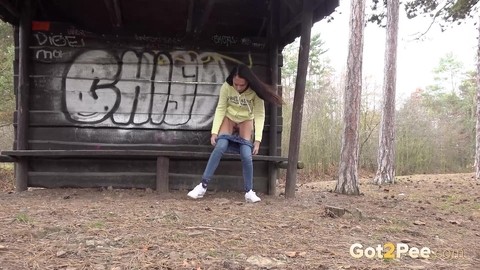 Tiny brunette Mistika squats for a piss next to a warming station in the woods | Фото 3