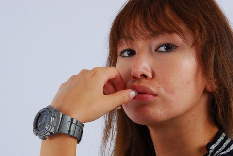 Asian redhead Evita models a grey G-Shock watch while fully clothed | Фото 1