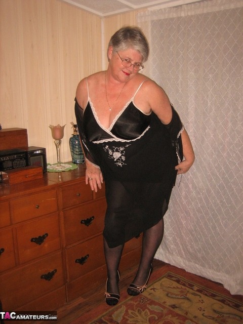 Overweight nan Girdle Goddess strips to her footwear in front of a dresser | Фото 5